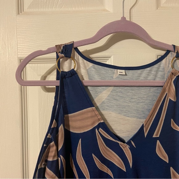 Navy Blue Floral Cold Shoulder Maxi Dress
Measurements in photos runs small - Picture 4 of 8